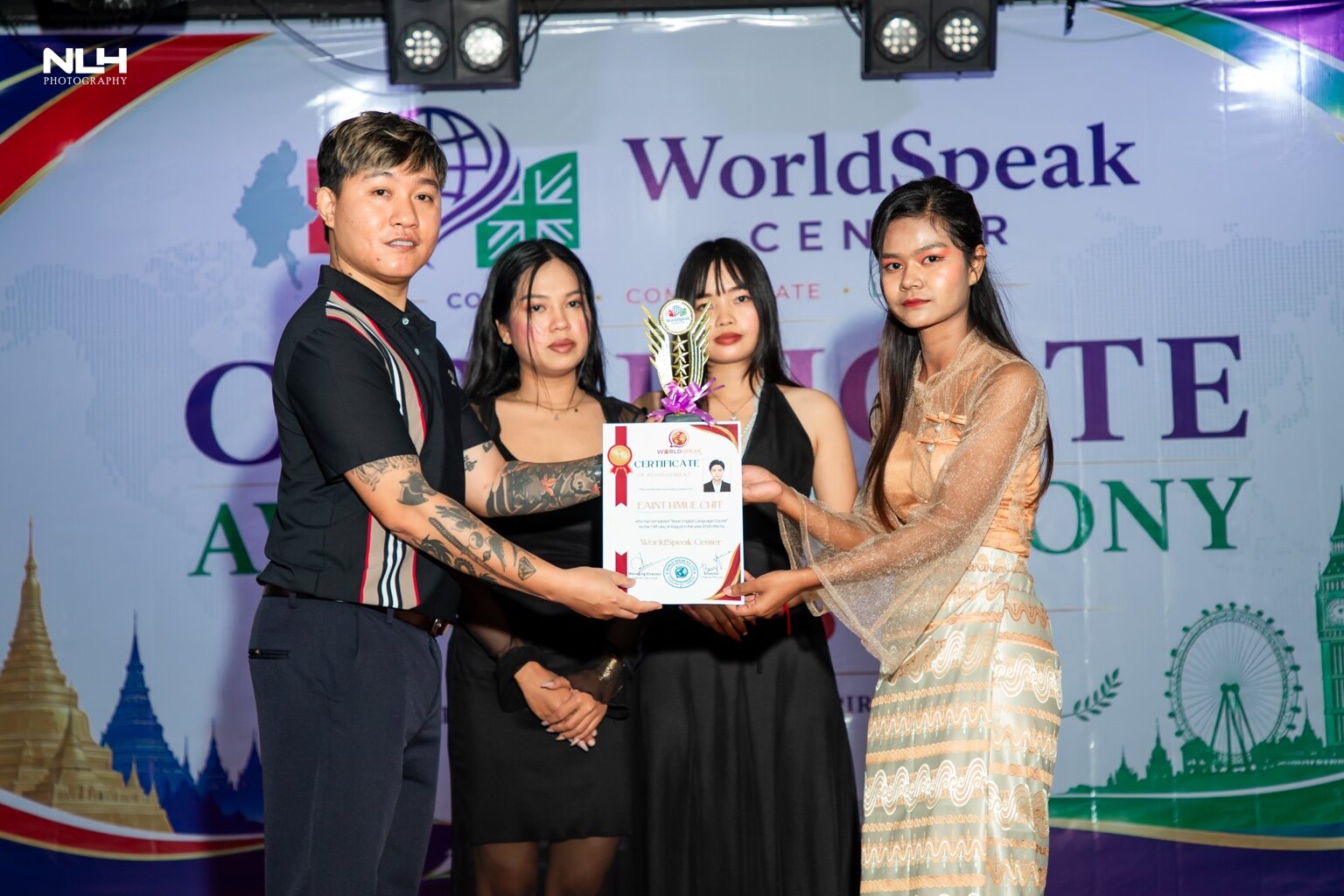 Student receiving a certificate at the ceremony